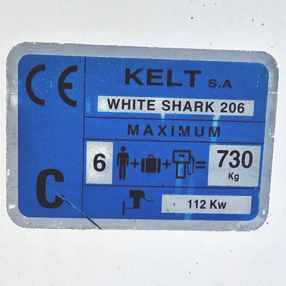 Kelt S.A. White Shark 206 label with weight and power information on a white background
